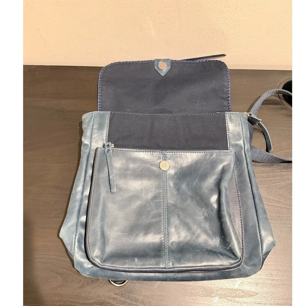 The Sak Ventura Slate Blue Leather Embossed Floral Convertible Backpack Bag